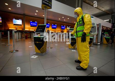 Disinfection teams constantly clean and disinfect El Dorado Terminal to prevent the spread of Novel Coronavirus after five months of inactivity El Dorado International Airport prepares with biosecurity measures to prevent the spread of the Novel Coronavirus to resume activities on september first with 14 diferent domesitc routes in Bogota, Colombia on August 31, 2020. (Photo by Sebastian Barros/NurPhoto) Stock Photo