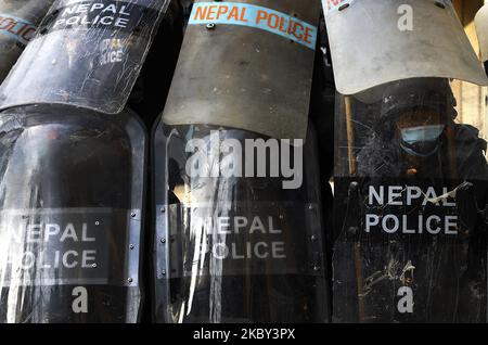 Police guard in formation with their riot shields during a clash ensued between police and locals at Pulchok as the latter started Machhindranath Jatra by pulling the chariot defying prohibitory orders in Lalitpur, Nepal September 3, 2020. according to Senior Superintendent Tek Prasad Rai, chief of Lalitpur Metropolitan Police Range, around 800 people had gathered in Pulchowk to pull the chariot. A clash ensued when police tried to stop them from pulling the chariot in view of the coronavirus restrictions. (Photo by Saroj Baizu/NurPhoto) Stock Photo