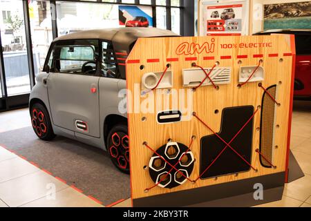 French marque Citroen 'PSA Group' announces the commercial launch of the tiny city electric car CITROEN AMI as a shared vehicle for young urbanites. Two adults can occupy the space with their bags and luggage. This vehicle has an attractive price to achieve the commercial target - September 03, 2020, Paris. (Photo by Daniel Pier/NurPhoto) Stock Photo