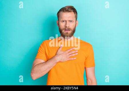 Photo of satisfied shocked person sullen face hand touch chest isolated on turquoise color background Stock Photo