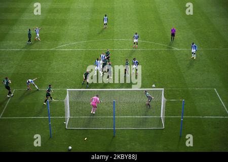 Rochdale's Eoghan O'Connell (right) clears a header attempted by Huddersfield Town's Harry Toffolo during the Carabao Cup 1st round match between Huddersfield Town and Rochdale at the John Smith's Stadium, Huddersfield. (Photo by Tim Markland/MI News/NurPhoto) Stock Photo