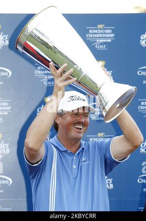 Jay Don Blake of USA, hold up tournament trophy during the PGA Tour ...