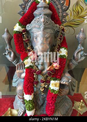 Brass idol of Lord Ganesha (Lord Ganesh) at the entrance of a Hindu temple in Toronto, Ontario, Canada. (Photo by Creative Touch Imaging Ltd./NurPhoto) Stock Photo