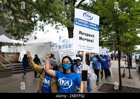 Nurses at the University of Illinois Hospital (UIH) rally on the first day of their strike in Chicago, IL on September 12, 2020. Hundreds of UIH nurses are demanding safe patient limits and adequate personal protective equipment. (Photo by Max Herman/NurPhoto) Stock Photo