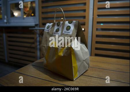 A McDelivery food bag is seen on September 18, 2020 in Warsaw, Poland. (Photo by Aleksander Kalka/NurPhoto) Stock Photo