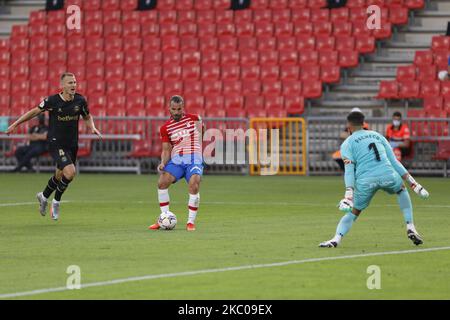 Roberto Soldado from Granada CF scores the first goal of the match during the La Liga match between Granada CF and Deportivo Alaves at Nuevo Los Carmenes Stadium on September 20, 2020 in Granada, Spain. (Photo by Álex Cámara/NurPhoto) Stock Photo