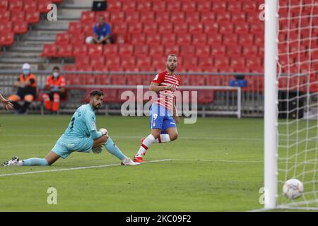 Roberto Soldado from Granada CF scores the first goal of the match during the La Liga match between Granada CF and Deportivo Alaves at Nuevo Los Carmenes Stadium on September 20, 2020 in Granada, Spain. (Photo by Álex Cámara/NurPhoto) Stock Photo