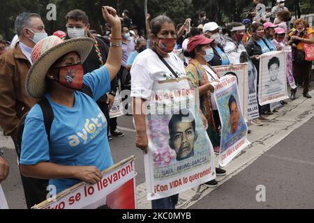 This Saturday, mothers and fathers of the 43 normalistas students who disappeared on September 26, 2014, members of indigenous communities and the black bloc, marched from the Angel of Independence to the Zócalo of Mexico City to demand justice and truth for this fact that caused great indignation in Mexico. (Photo by Gerardo Vieyra/NurPhoto) Stock Photo