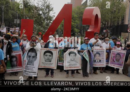 This Saturday, mothers and fathers of the 43 normalistas students who disappeared on September 26, 2014, members of indigenous communities and the black bloc, marched from the Angel of Independence to the Zócalo of Mexico City to demand justice and truth for this fact that caused great indignation in Mexico. (Photo by Gerardo Vieyra/NurPhoto) Stock Photo