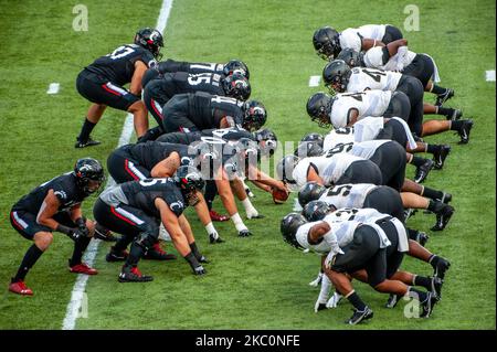 Players wait for the snap during a second half Cincinnati field goal attempt during an NCAA college football game at Nippert Stadium between the University of Cincinnati Bearcats and the Army Black Nights. Cincinnati defeated Army 24-10. Saturday, September 26th, 2020, in Cincinnati, Ohio, United States. (Photo by Jason Whitman/NurPhoto) Stock Photo