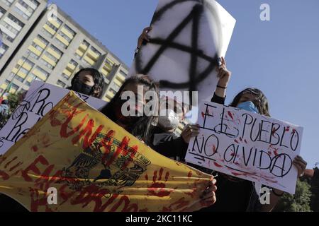 Members of the Black Bloc marched from the Plaza de las Tres Culturas and tried to reach the Zócalo in Mexico City, on the occasion of the 52nd anniversary of the Tlatelolco Massacre, Mexico. (Photo by Gerardo Vieyra/NurPhoto) Stock Photo