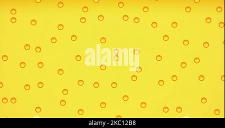 Liquid yellow gel on a screen of microscope or sparking water Stock Photo