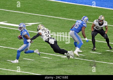 Detroit Lions safety Miles Killebrew (35) runs the ball against New Orleans Saints running back Dwayne Washington (24) during the first half of an NFL football game in Detroit, Michigan USA, on Sunday, October 4, 2020 (Photo by Jorge Lemus/NurPhoto) Stock Photo