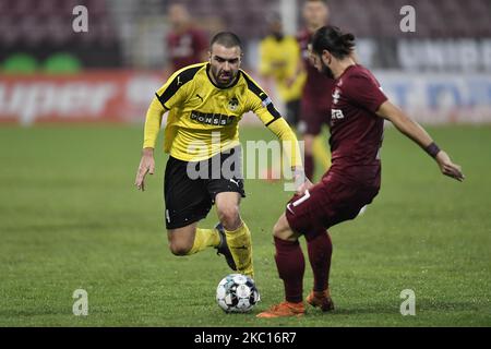 Nuno Tomas of KuPS in action against Constantin Paun of CFR Cluj during the UEFA Europea League Play-Off between CFR Cluj v KuPS Kupion Palloseura, on October 1, 2020 in Cluj-Napoca, Romania. (Photo by Alex Nicodim/NurPhoto) Stock Photo