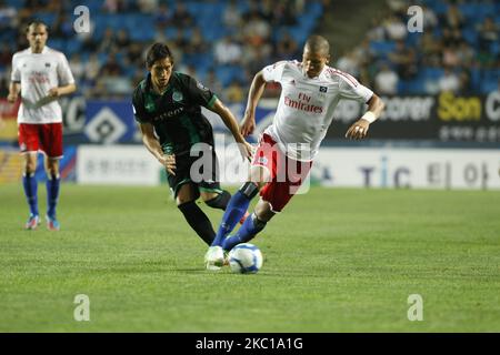 Hamburger SV of Germany and FC Groningen of Netherland players compete ball during the Peace Cup Suwon qualifying round on July 20, 2012 in Suwon, South Korea. Hamburger SV won the match 2-1. (Photo by Seung-il Ryu/NurPhoto) Stock Photo