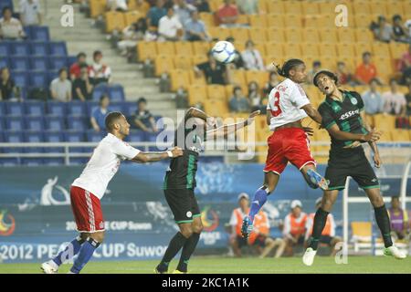 Hamburger SV of Germany and FC Groningen of Netherland players compete ball during the Peace Cup Suwon qualifying round on July 20, 2012 in Suwon, South Korea. Hamburger SV won the match 2-1. (Photo by Seung-il Ryu/NurPhoto) Stock Photo