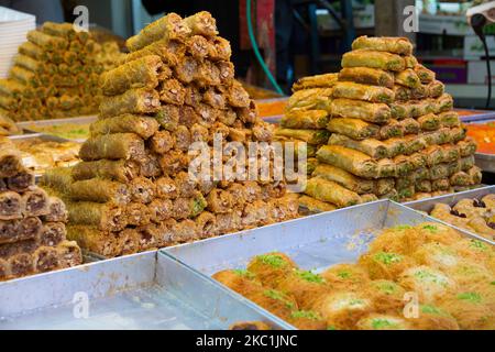 moroccan chebakia and varied pastry cookies for sale at the market, street. food and business concept. Selective focus. Stock Photo