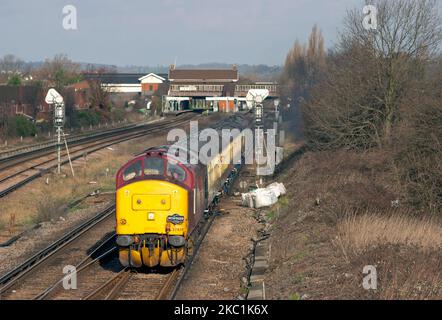 A pair of EWS Class 37 Diesel locomotives numbers 37410 and 37406 top and tailing an enthusiast railtour approaching Gatwick Airport. Stock Photo