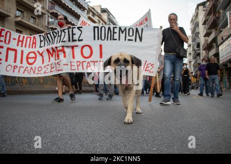 Protest march took place on the roads of Thessaloniki city in Greece against the official visit of the United States secretary of state Mike Pompeo or officially Michael Richard Pompeo as part of his visit in Greece. Anti-Pompeo, Anti-US and Anti-Nato or inscriptions saying Pompeo Go Gome on banners have been held by protesters following the same slogans by various communist, leftist groups, organizations, labor or student unions etc that participated. In front of the US consulate, a handmade US flag was glued down so people stepped on it and then the flag of the USA was burned. Thessaloniki,  Stock Photo