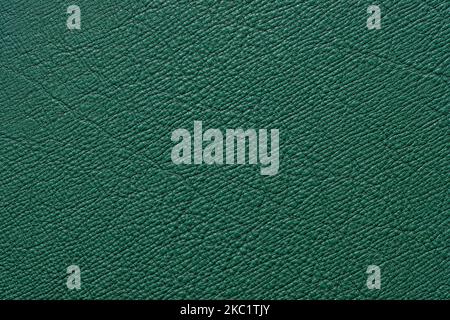 cowhide leather texture green color as background Stock Photo