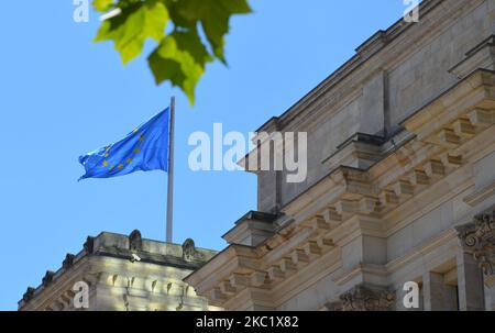 blue european flag is waving on top of german parliament building "Reichstag" Stock Photo