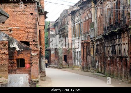 View of ancient building in Panam City, Bangladesh, on October 16, 2020. Panam Nagar, it was the most attractive historical city in Bangladesh. Visitors take time-off from the hustle and bustle from the urban busy life, but enjoy walking through the lane of the ancient city adorned with dilapidated, vandalised and illegally occupied derelict red brick buildings in Panam Nagar.Panam Nagar, lies 30 miles southeast of the capital Dhaka at Sonargaon. The rich Hindu traders laid the foundation of Panam Nagar, is standing on the both sides of a road that stretches from east to south and measures 600 Stock Photo