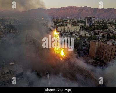 On the day the social revolt began in Chile, a fire broke out in the Asuncion Parish in downtown Santiago, Chile, on October 18, 2020. (Photo by Felipe Figueroa/Nurphoto) Stock Photo