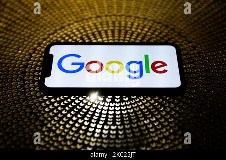 Google logo displayed on a phone screen is seen in this illustration photo taken on October 18, 2020. (Photo Illustration by Jakub Porzycki/NurPhoto) Stock Photo