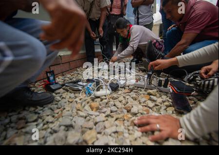 Indigenous members of the CRIC and other indigenous associations of Colombia, camp at 'El Palacio de los Deportes' after a week long trip on colombian roads to protest against the social leaders assasinations, the massacres in the country, and the implementation of the peace process, in Bogota, Colombia, october 20, 2020. Indigenous leaders gave a press conferences along orginizers of the national strike to show support in the demonstrations that will take in the city on october 21. (Photo by Sebastian Barros/NurPhoto) Stock Photo