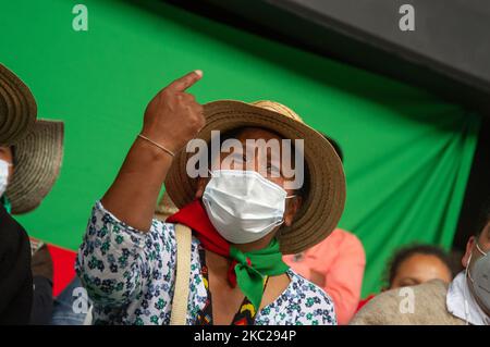 Indigenous members of the CRIC and other indigenous associations of Colombia, camp at 'El Palacio de los Deportes' after a week long trip on colombian roads to protest against the social leaders assasinations, the massacres in the country, and the implementation of the peace process, in Bogota, Colombia, october 20, 2020. Indigenous leaders gave a press conferences along orginizers of the national strike to show support in the demonstrations that will take in the city on october 21. (Photo by Sebastian Barros/NurPhoto) Stock Photo