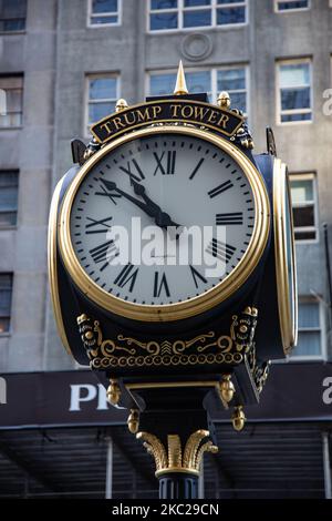 Clock in front of Trump Tower. Trump Tower in New York city in the USA. The 58-floor skyscraper at Fifth Avenue in Midtown Manhattan hosts the headquarters for Trump Organization and houses the penthouse condominium residence of US President Donald Trump, who is also a businessman and real estate developer. The building was designed by Der Scutt in modernism architecture with glass and stepped facade at the building, construction began in 1979 in NYC. New York, USA on February 2020 (Photo by Nicolas Economou/NurPhoto) Stock Photo