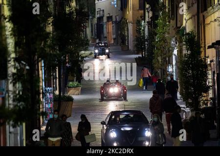 The passage of the historic parade of the ''Mille Miglia'' which started from Brescia and headed for Rome, in Rieti, Italy, on October 23, 2020. The race has already been postponed from May to October due to the first wave of the Covid 19 epidemic that hit Italy. Brescia, the city of departure and arrival, was one of the most affected by the pandemic and even now, at the begin of the second wave, it already seems to be in a difficult situation. The race, usually welcomed by the city. it is now surrounded by controversy regarding its development at such a difficult time. (Photo by Riccardo Fabi Stock Photo