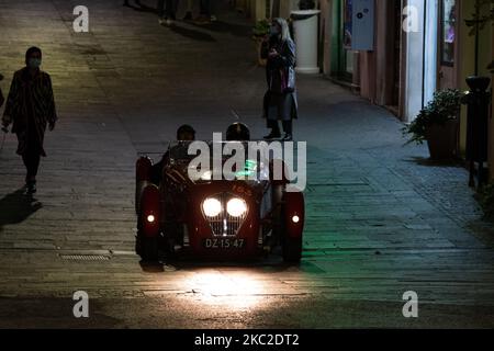 The passage of the historic parade of the ''Mille Miglia'' which started from Brescia and headed for Rome, in Rieti, Italy, on October 23, 2020. The race has already been postponed from May to October due to the first wave of the Covid 19 epidemic that hit Italy. Brescia, the city of departure and arrival, was one of the most affected by the pandemic and even now, at the begin of the second wave, it already seems to be in a difficult situation. The race, usually welcomed by the city. it is now surrounded by controversy regarding its development at such a difficult time. (Photo by Riccardo Fabi Stock Photo