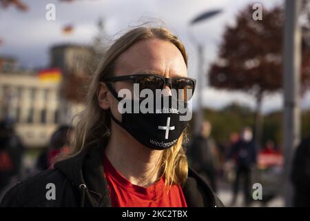 People and employees of the event industry attend a demonstration under the motto Alarmstufe Rot (Alarm level red) to protest against measures considered too hard and damaging of the sector and demand government assistance during the second wave of the coronavirus pandemic on October 28, 2020 in Berlin, Germany. (Photo by Emmanuele Contini/NurPhoto) Stock Photo