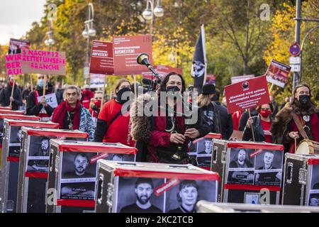 People and employees of the event industry attend a demonstration under the motto Alarmstufe Rot (Alarm level red) to protest against measures considered too hard and damaging of the sector and demand government assistance during the second wave of the coronavirus pandemic on October 28, 2020 in Berlin, Germany. (Photo by Emmanuele Contini/NurPhoto) Stock Photo