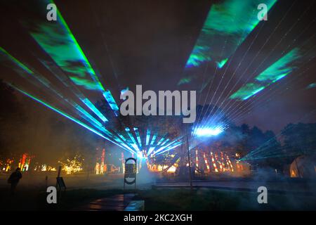 Laser performance inside the open-air exhibition 'Alice in Wonderland - Garden of Lights' at the Museum of Municipal Engineering and CD Lighting in the Garden of Experiences in Krakow. On Thursday, October 29, 2020, in Krakow, Poland. (Photo by Artur Widak/NurPhoto) Stock Photo