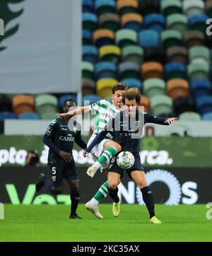 Pedro Goncalves(L) of Sporting CP vies Joao Pedro(R) of CD Tondela during the Liga NOS match between Sporting CP and CD Tondela at Estadio Jose Alvalade on November 1, 2020 in Lisbon, Portugal. (Photo by Paulo Nascimento/NurPhoto) Stock Photo
