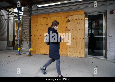 A view of boarded-up luxury stores along Madison Avenue on November 3, 2020 in New York City. After a record-breaking early voting turnout, Americans head to the polls on the last day to cast their vote for incumbent U.S. President Donald Trump or Democratic nominee Joe Biden in the 2020 presidential election. (Photo by John Nacion/NurPhoto) Stock Photo