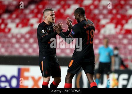Glen Kamara of Rangers FC (R ) celebrates with Steven Davis after scoring during the UEFA Europa League group D football match between SL Benfica and Rangers FC at the Luz stadium in Lisbon, Portugal on November 5, 2020. (Photo by Pedro FiÃºza/NurPhoto) Stock Photo