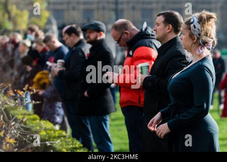 Veterans are seen watching a National Service of Remembrance at the Cenotaph behind the fence at The Parliament Square in London, Britain, 08 November 2020. Remembrance Sunday services are still able to go ahead despite the covid-19 measures in place across the various nations of the UK. Each country has issued guidelines to ensure the safety of those taking part. (Photo by Maciek Musialek/NurPhoto) Stock Photo