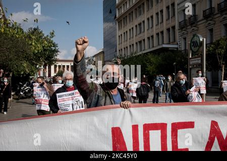 Protesters seen shouting slogans and holding banner in Athens, Greece on November 17, 2020 during a demonstration on the 47th anniversary of Polytechnic school uprising against the military junta that was ruling Greece in 1973. (Photo by Nikolas Kokovlis/NurPhoto) Stock Photo