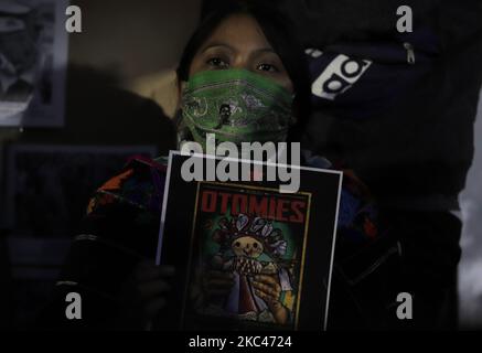 Members of the Otomí community in the occupation of the National Institute of Indigenous Peoples in Mexico City, during a speech and celebrations on the occasion of the 37th anniversary of the Zapatista Army of National Liberation (EZLN) in Mexico. The origins of the EZLN go back to the early years of the 1980s, when a small guerrilla group made up of mestizos and indigenous peoples settled in the mountainous area of the Lacandon Jungle, in Chiapas, with the intention of creating a front that would promote the struggle armed in the country. (Photo by Gerardo Vieyra/NurPhoto) Stock Photo