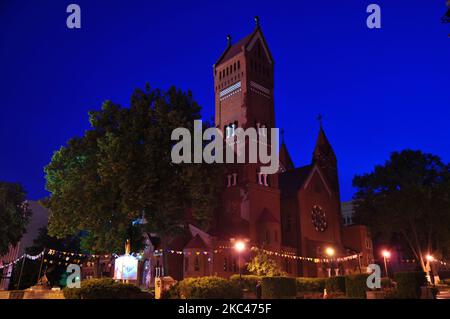 Minsk, Belarus - July 01, 2014: Belarussian Roman Catholic Church Of Saints Simon And Helen or Red Church On Independence Square In Minsk, Belarus Stock Photo