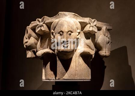 Decorative sculptures carved on ancient piece of roman column Stock Photo