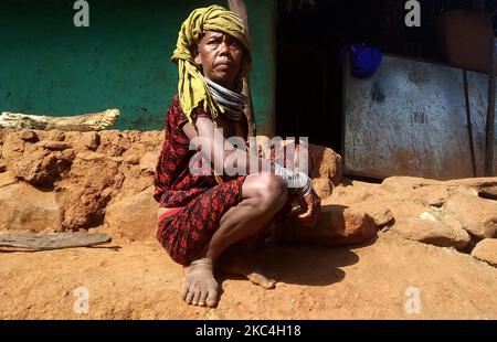 Indigenous Bonda cast tribes are seen at their living valley as they are busy on their daily life at Malkangiri district of Odisha state, above 500 km away from the eastern Indian state Odisha's capital city Bhubaneswar. These tribes till now continuing their traditional livelihoods at their living hills with their traditional attire and maintaining their living style beyond the modern society (Photo by STR/NurPhoto) Stock Photo