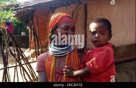 Indigenous Bonda cast tribes are seen at their living valley as they are busy on their daily life at Malkangiri district of Odisha state, above 500 km away from the eastern Indian state Odisha's capital city Bhubaneswar. These tribes till now continuing their traditional livelihoods at their living hills with their traditional attire and maintaining their living style beyond the modern society (Photo by STR/NurPhoto) Stock Photo