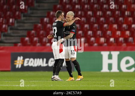 Mario Götze, of PSV Eindhoven and Philipp Max, of PSV Eindhoven celebrates the victory during the UEFA Europa League Group E stage match between Granada CF and PSV Eindhoven at Estadio Nuevo Los Carmenes on December 3, 2020 in Granada, Spain. Football stadiums across Europe remain closed to fans due to the Coronavirus Pandemic. (Photo by Álex Cámara/NurPhoto) Stock Photo