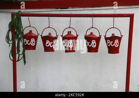 Fire buckets at a filling station in the city of Kandy, Sri Lanka. (Photo by Creative Touch Imaging Ltd./NurPhoto) Stock Photo