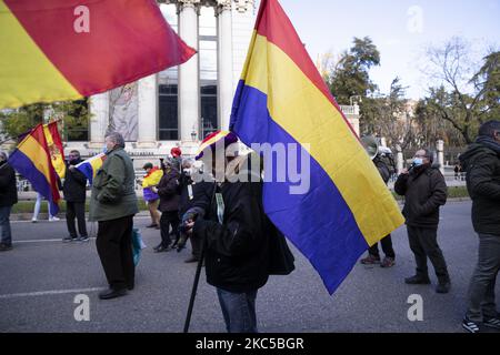 Demonstrators showing republican flags, march through the streets of central Madrid in support of a third Republic in Spain, the day the Spanish Constitution is celebrated, in Madrid December 6, 2020 Spain (Photo by Oscar Gonzalez/NurPhoto) Stock Photo