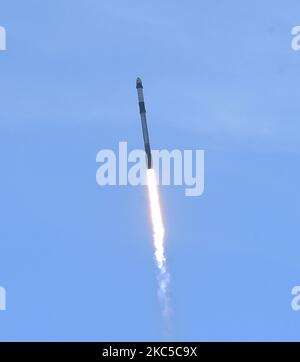 As seen from the beach at Canaveral National Seashore, a SpaceX Falcon 9 rocket with the Dragon spacecraft launches from pad 39A at the Kennedy Space Center on December 6, 2020 in Cape Canaveral, Florida. The cargo mission will deliver over 6,400 pounds of crew supplies and research experiments to the International Space Station. (Photo by Paul Hennessy/NurPhoto) Stock Photo